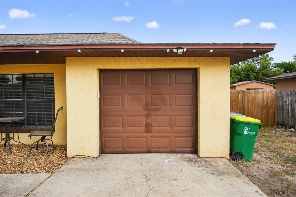 1644 Ruth Street Cocoa, FL 32926 - Photo 32 of 38 a view of a garage door