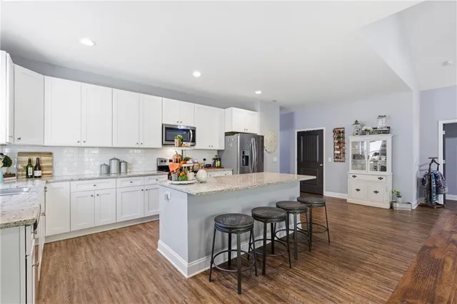 a bed room with a bed and a television