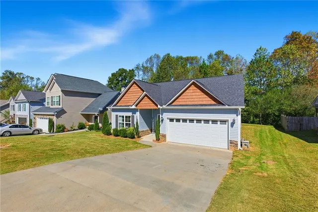 a house with trees in the background
