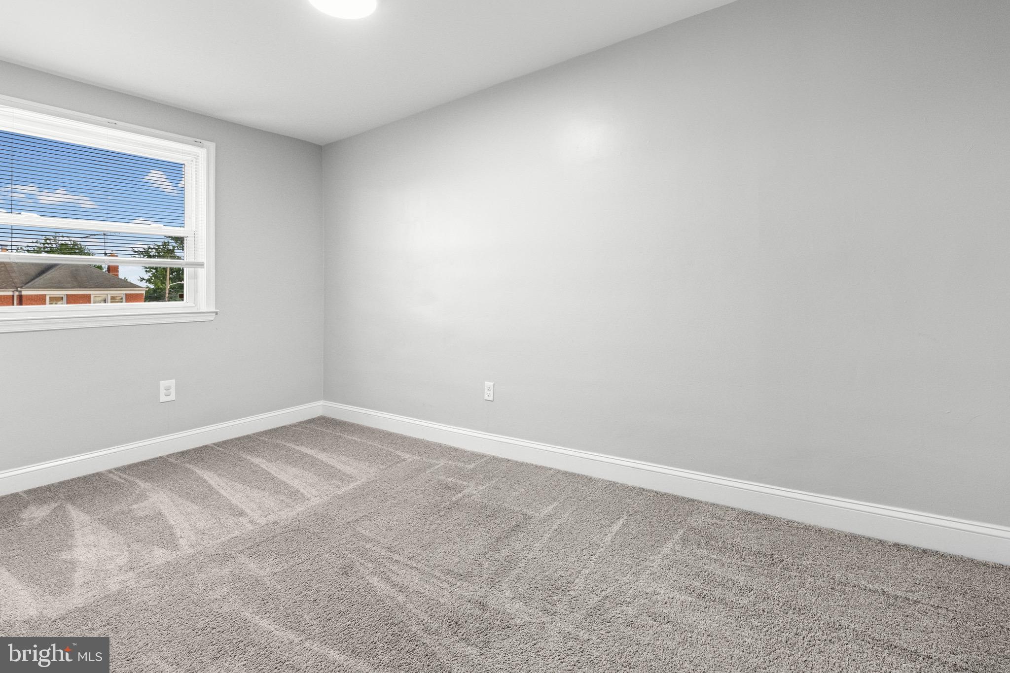 2203 Redthorn Road Baltimore, MD 21220 - Photo 15 of 23 an empty room with a window