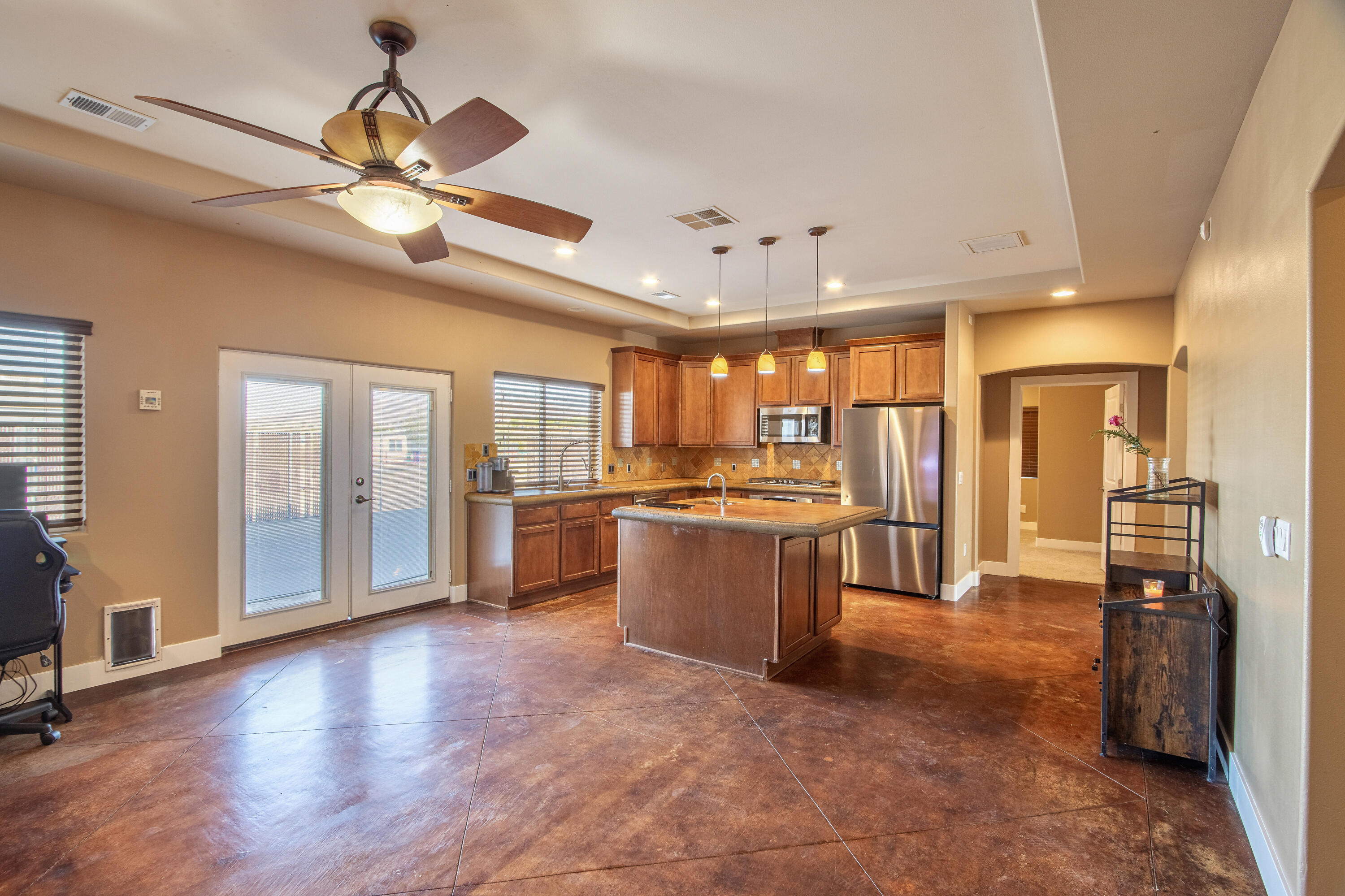 7225 Adobe Road Twentynine Palms, CA 92277 - Photo 12 of 61 a view of a large kitchen with a sink and refrigerator
