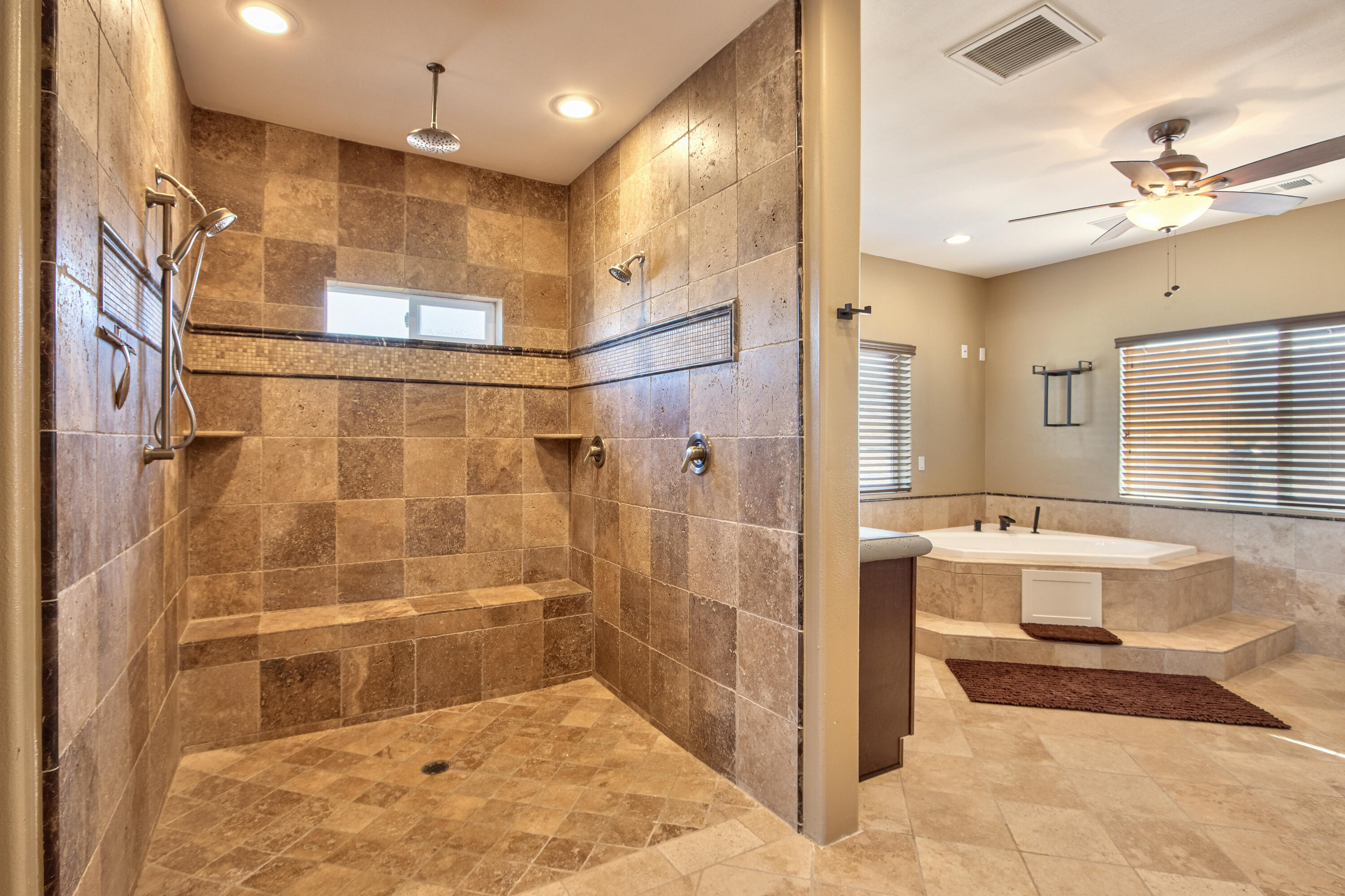 7225 Adobe Road Twentynine Palms, CA 92277 - Photo 19 of 61 a bathroom with a bathtub and a shower
