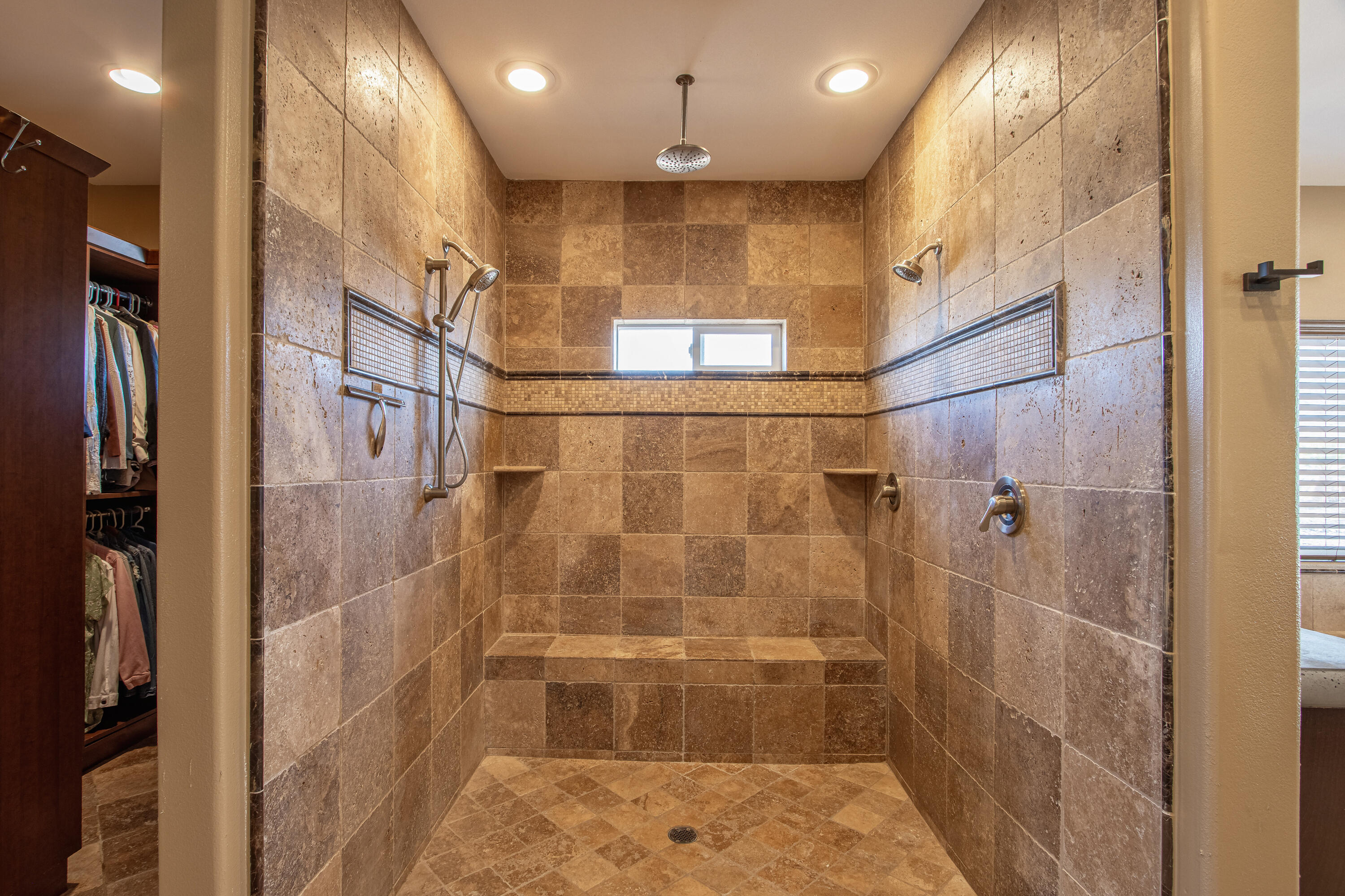 7225 Adobe Road Twentynine Palms, CA 92277 - Photo 20 of 61 a bathroom with a glass shower door and a shower