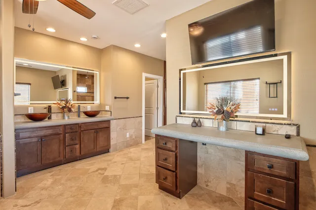 a kitchen with sink and cabinets
