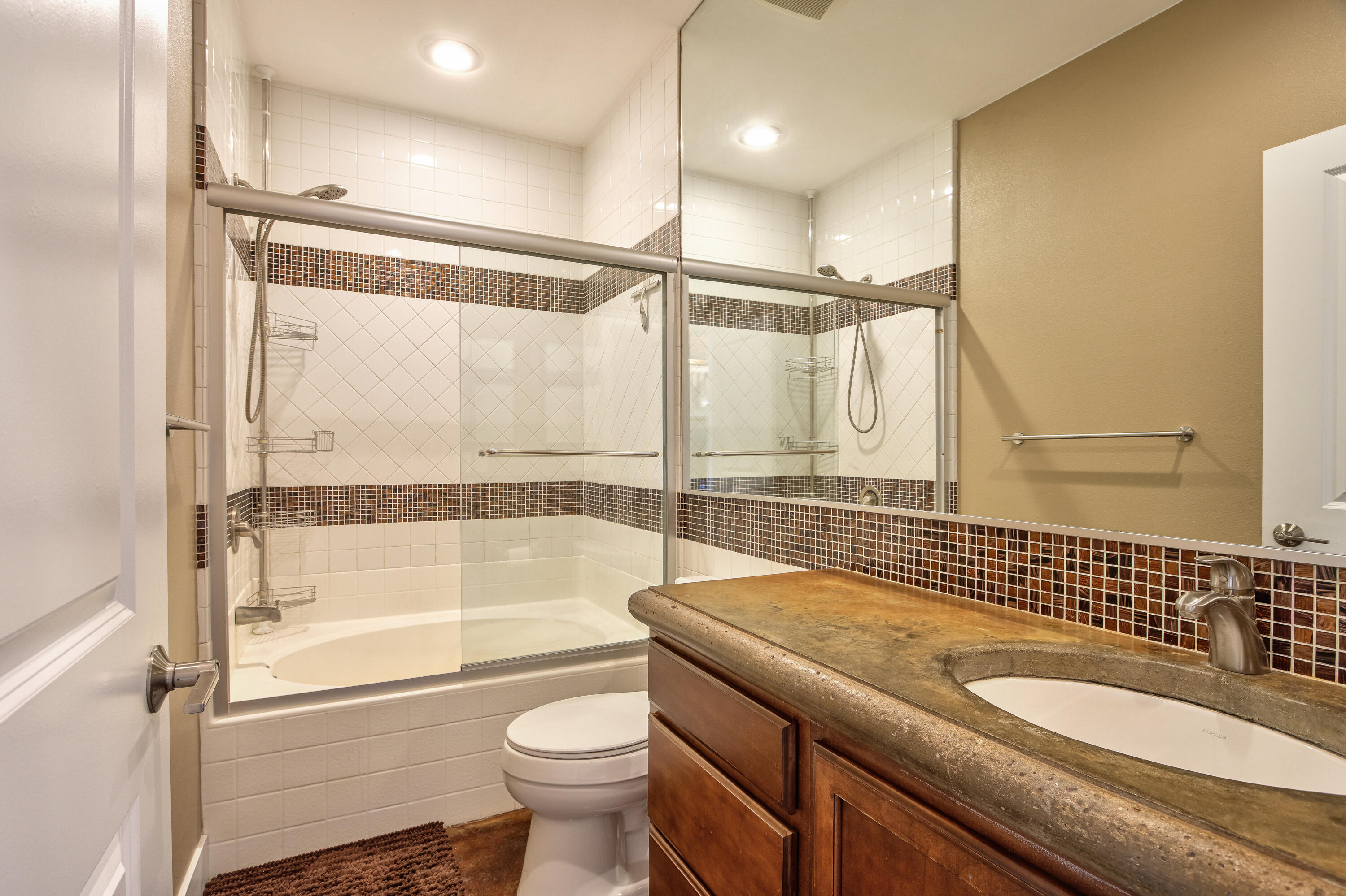 7225 Adobe Road Twentynine Palms, CA 92277 - Photo 28 of 61 a bathroom with a sink a toilet and shower
