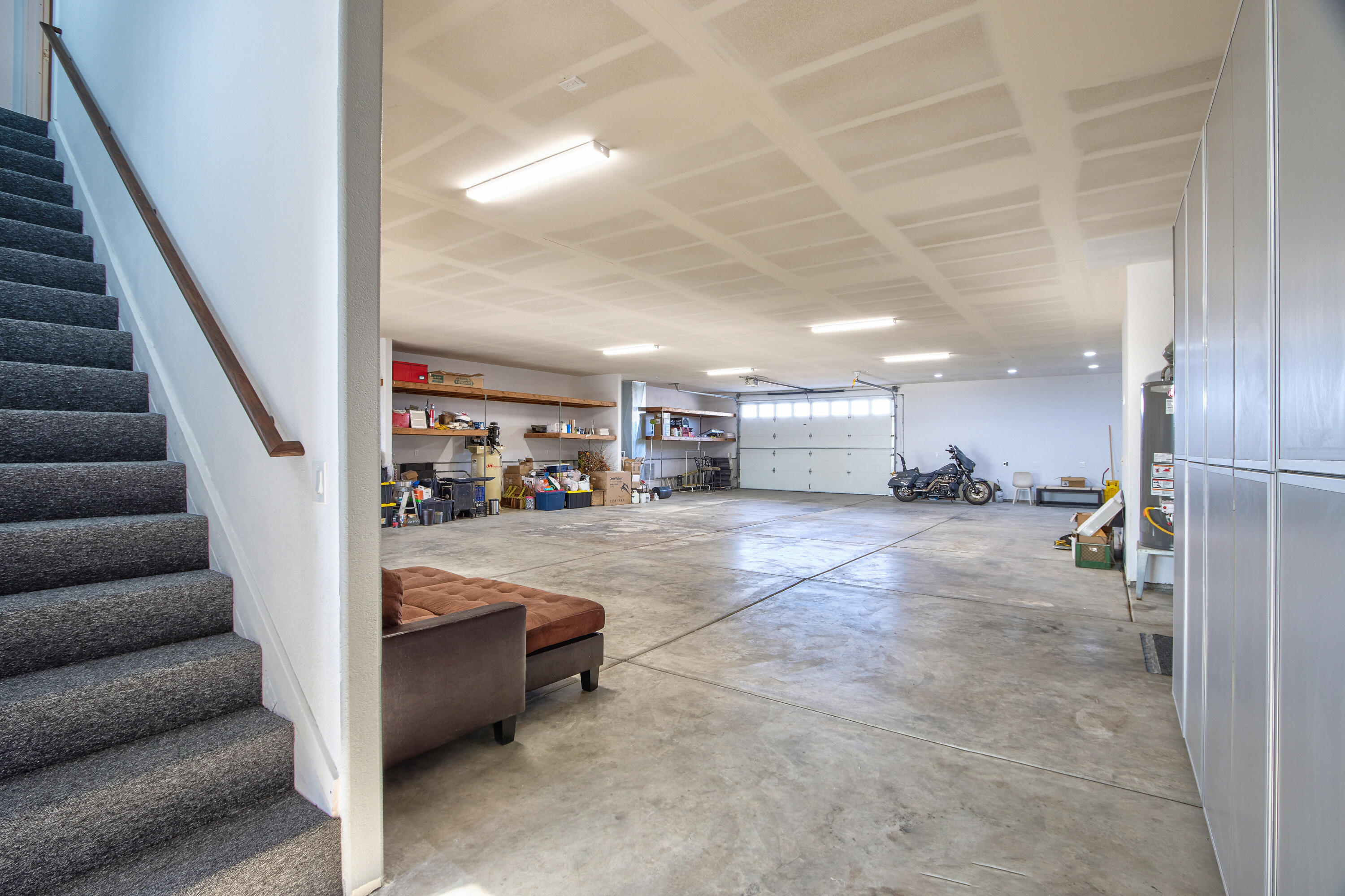 7225 Adobe Road Twentynine Palms, CA 92277 - Photo 35 of 61 a view of livingroom with furniture and staircase