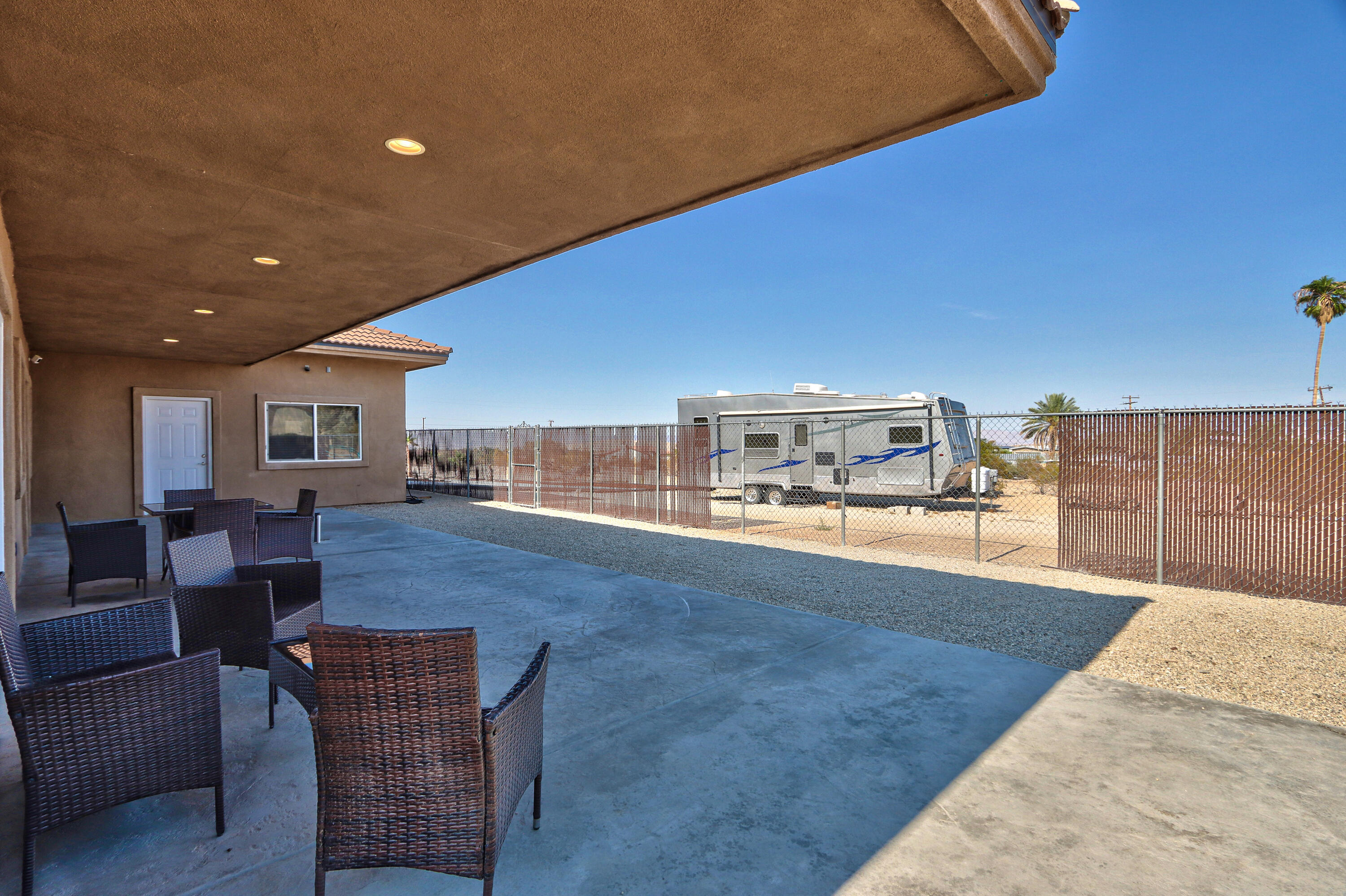 7225 Adobe Road Twentynine Palms, CA 92277 - Photo 47 of 61 a living room with furniture and a wooden floor