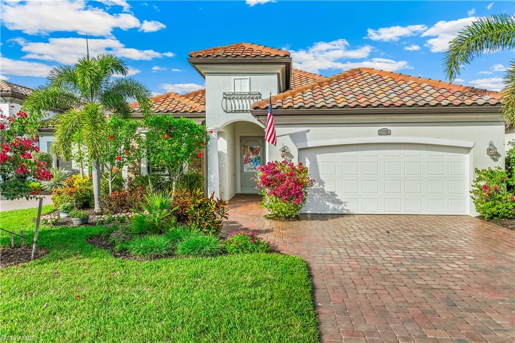 12735 Kinross Lane Naples, FL 34120 - Photo 2 of 41 Front elevation, beautifully landscaped