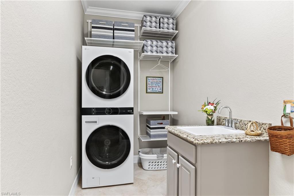 12735 Kinross Lane Naples, FL 34120 - Photo 24 of 41 Laundry room redesigned new large capacity washer/dryer