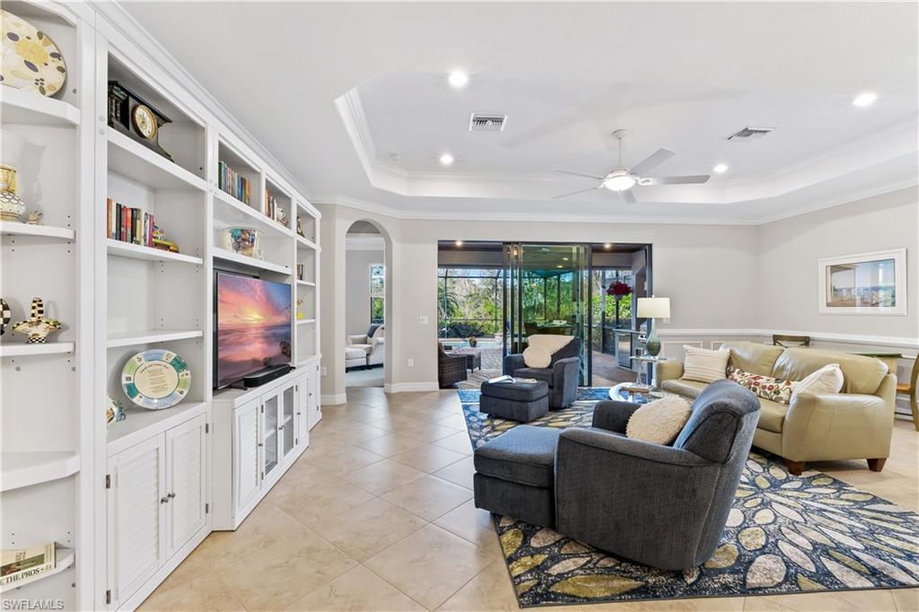 12735 Kinross Lane Naples, FL 34120 - Photo 4 of 41 Living area with custom built-ins