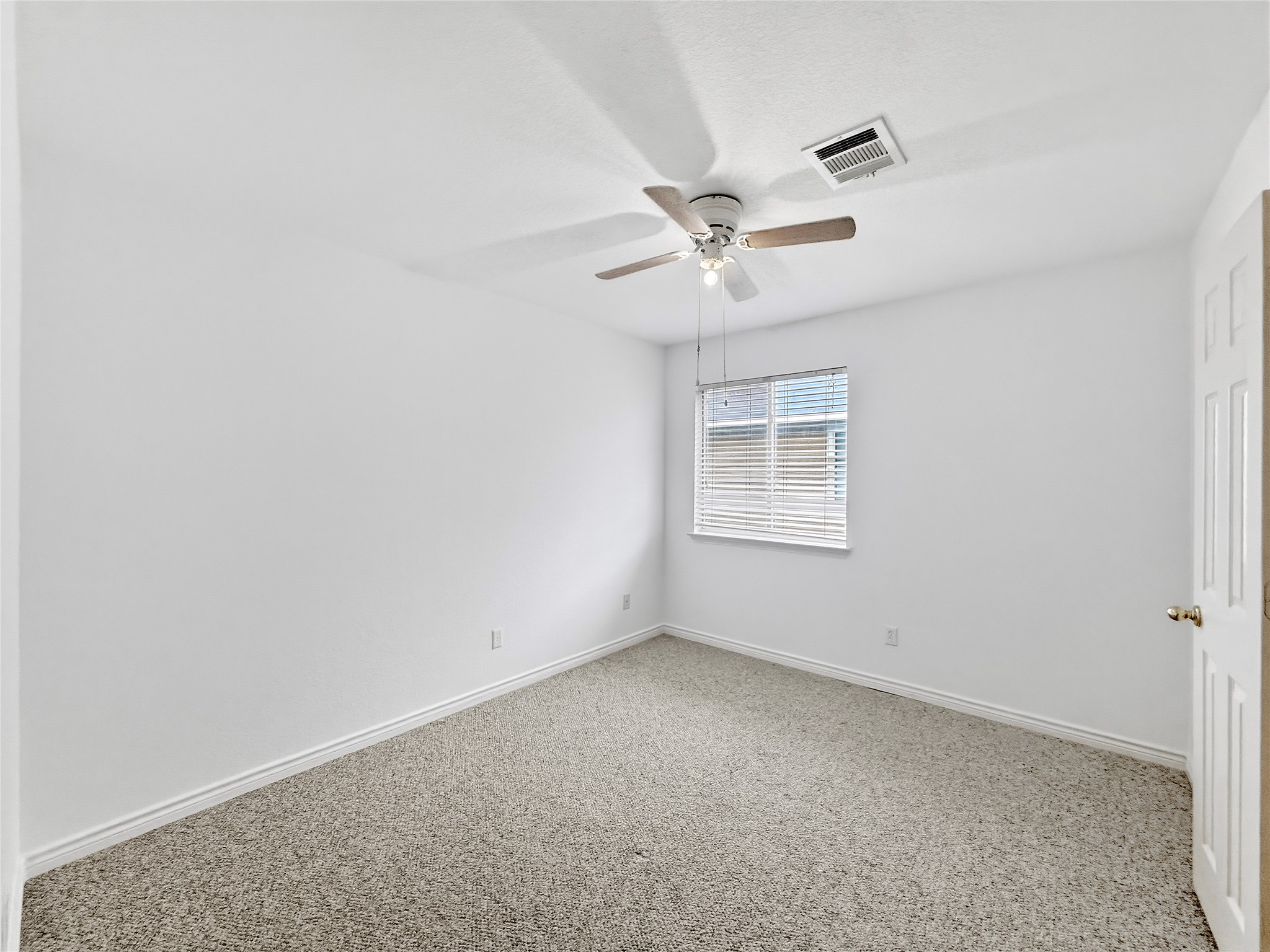 9215 Rowlands Sayle Road Austin, TX 78744 - Photo 12 of 14 Spare Bedroom 1