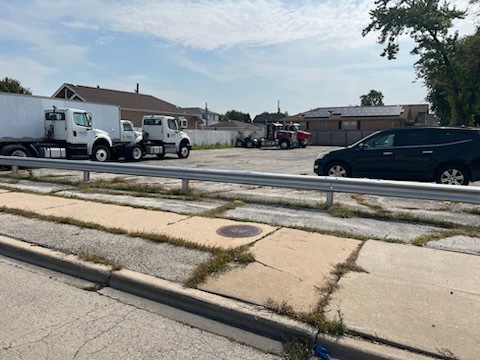 3534 West 103rd Street Chicago, IL 60655 - Photo 2 of 4 a view of street with cars