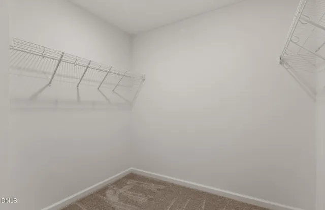 a bathroom with a sink toilet and mirror