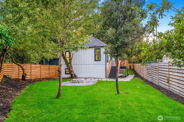 a view of a backyard with a slide