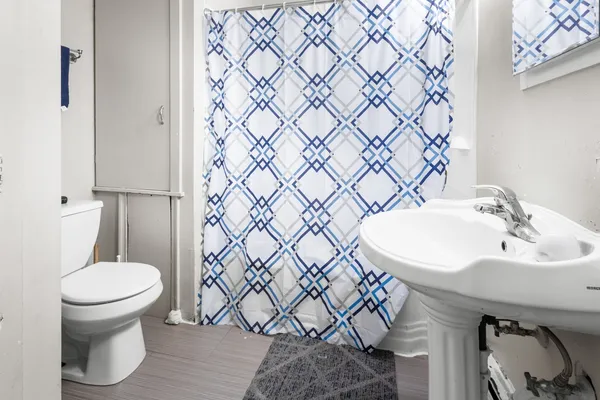 a bathroom with a sink and a toilet