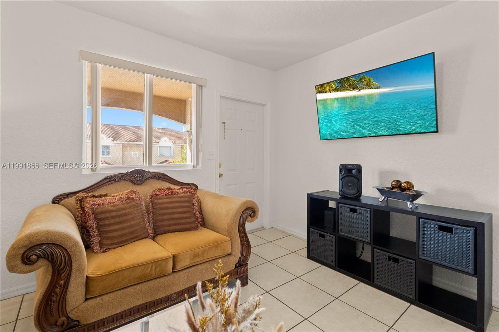317 East 3rd Street, Unit 201 Hialeah, FL 33010 - Photo 3 of 50 a living room with furniture