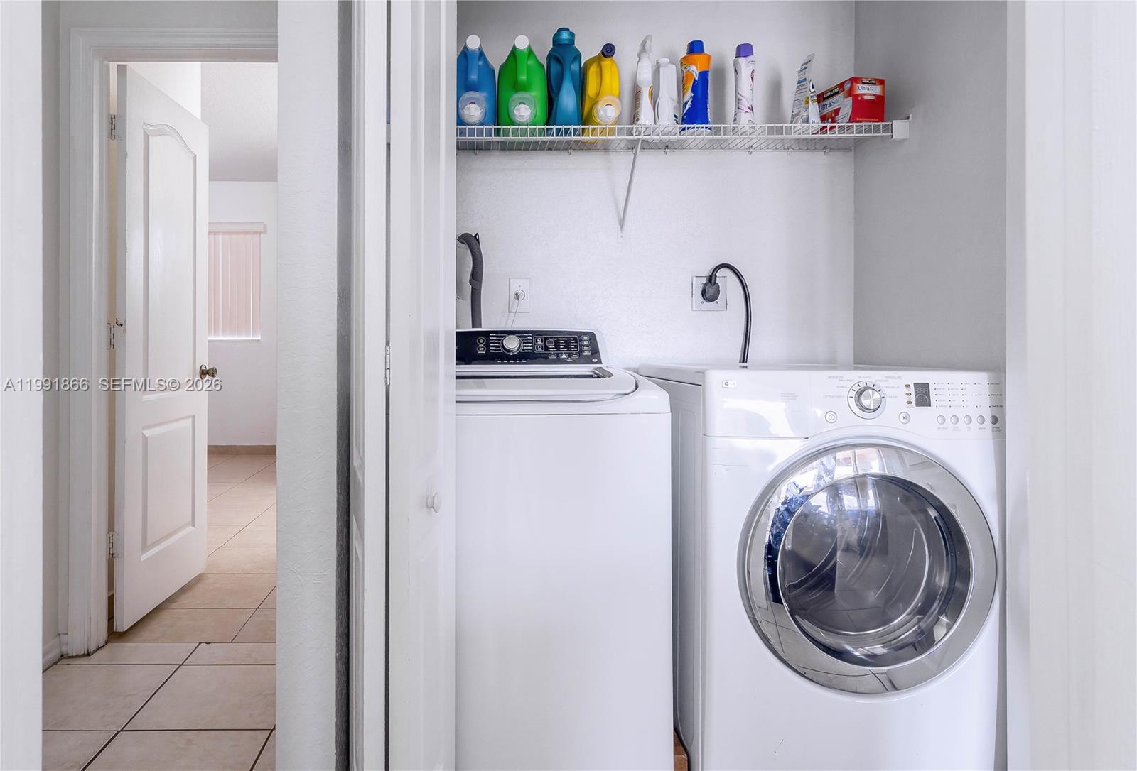 317 East 3rd Street, Unit 201 Hialeah, FL 33010 - Photo 33 of 50 a utility room with dryer and washer