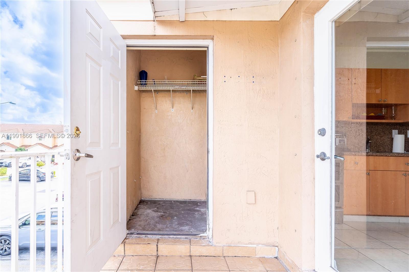 317 East 3rd Street, Unit 201 Hialeah, FL 33010 - Photo 34 of 50 a view of a bedroom from a hallway