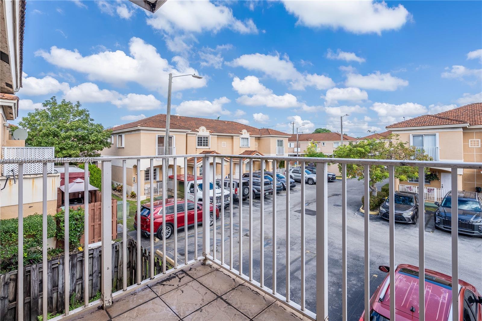 317 East 3rd Street, Unit 201 Hialeah, FL 33010 - Photo 35 of 50 a view of a houses with a tv