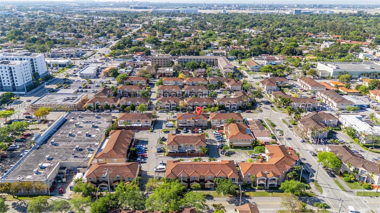 317 East 3rd Street, Unit 201 Hialeah, FL 33010 - Photo 41 of 50 an aerial view of residential houses with outdoor space