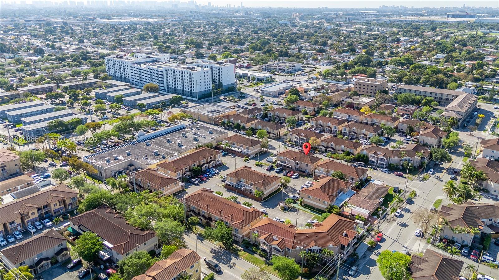 317 East 3rd Street, Unit 201 Hialeah, FL 33010 - Photo 44 of 50 an aerial view of a city with lots of residential buildings