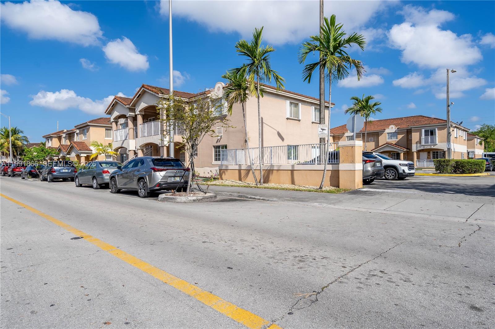 317 East 3rd Street, Unit 201 Hialeah, FL 33010 - Photo 50 of 50 a view of a street in front of a building
