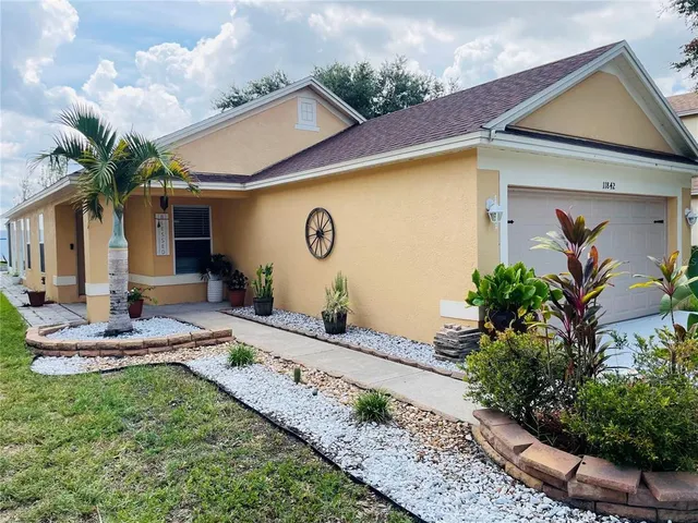a front view of house with yard