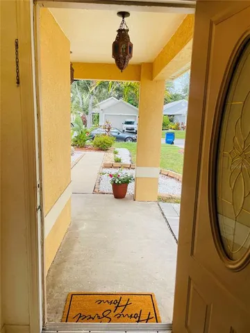 a view of a living room with a balcony