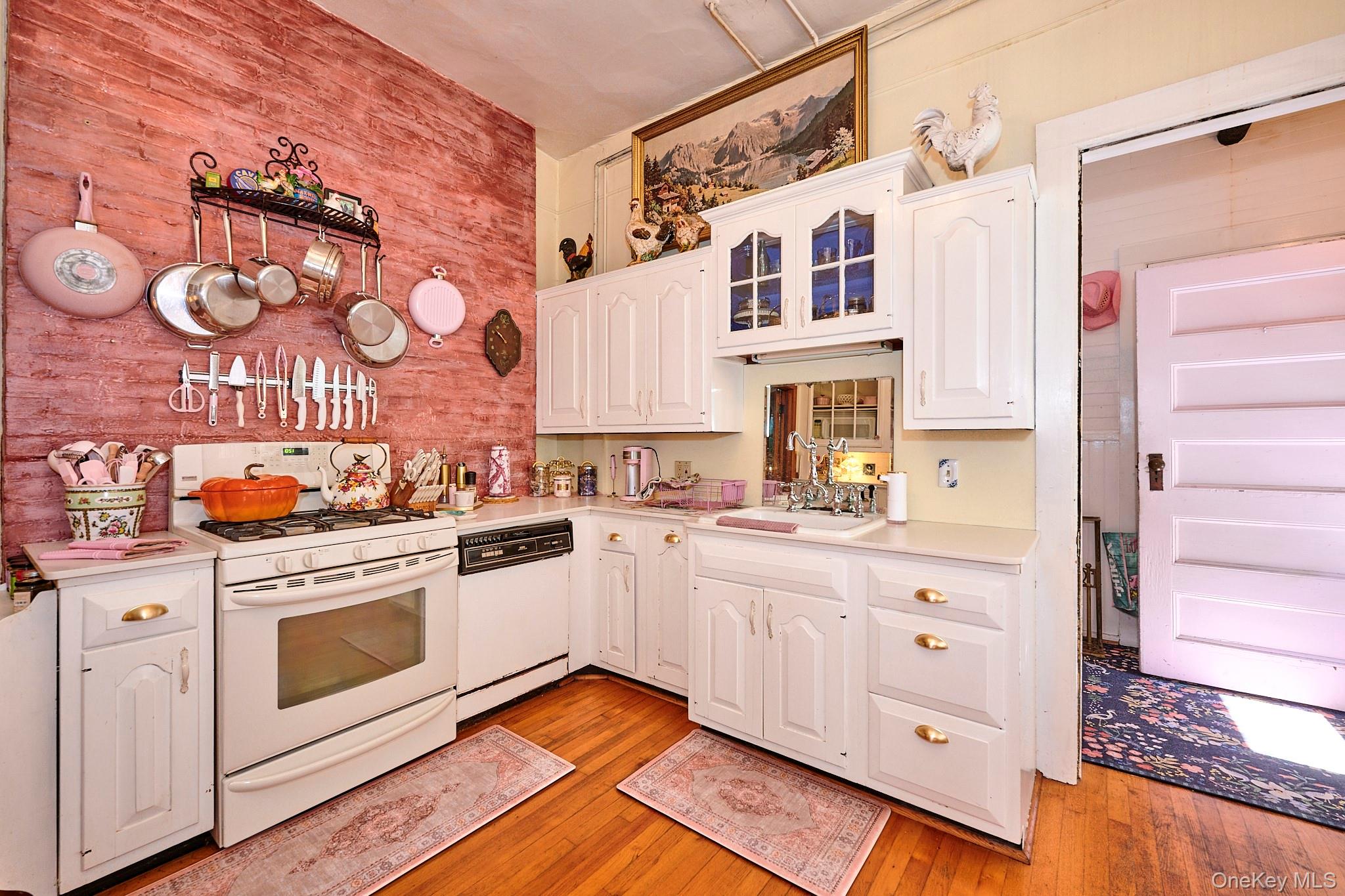 22 Proctor Road Eldred, NY 12732 - Photo 22 of 50 a kitchen with cabinets and wooden floor