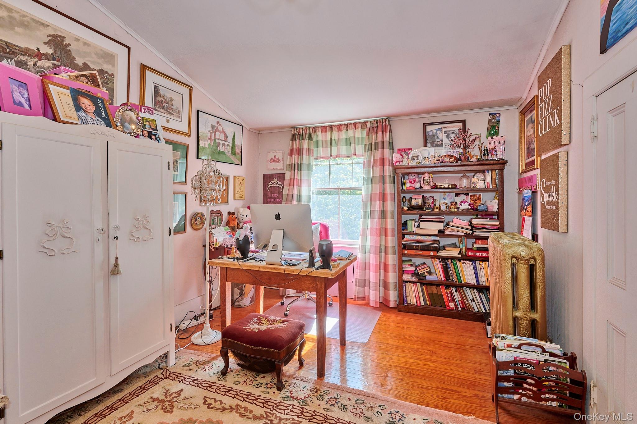 22 Proctor Road Eldred, NY 12732 - Photo 29 of 50 a living room with furniture and a book shelf