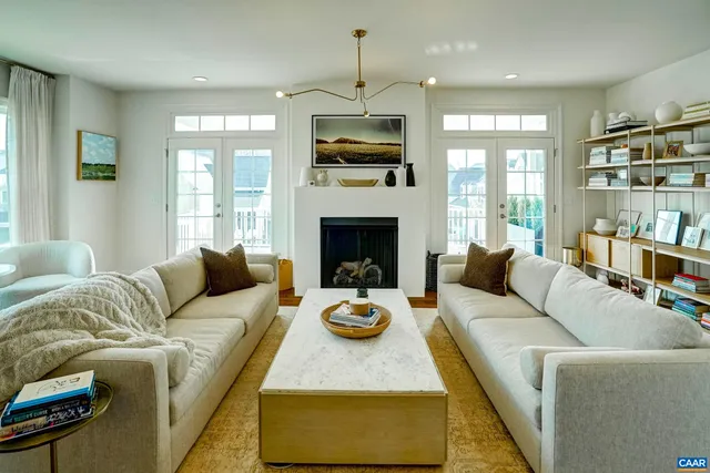 a spacious bedroom with a bed and a large window