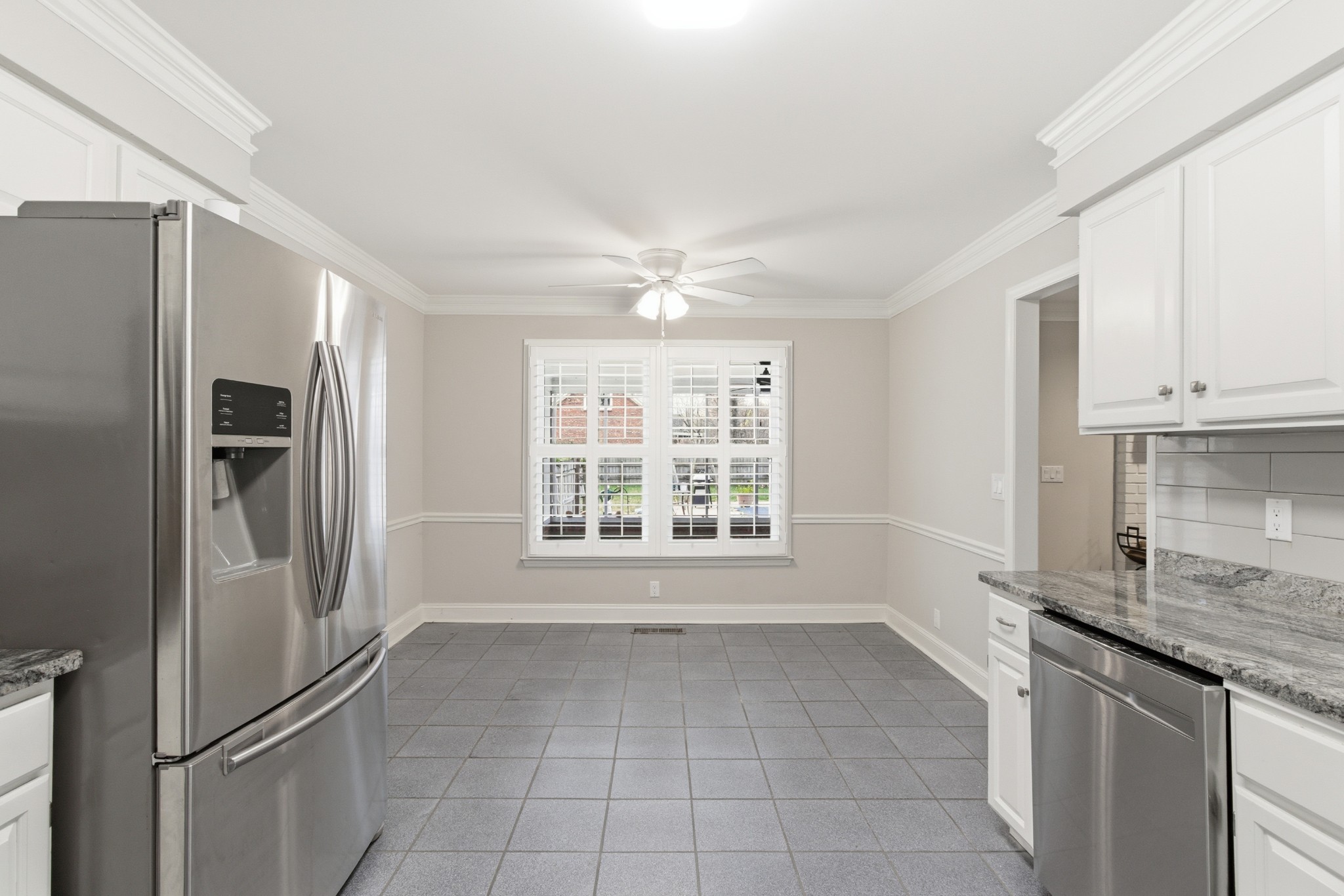 707 Banner Drive Murfreesboro, TN 37129 - Photo 11 of 46 a kitchen with granite countertop a refrigerator and a sink