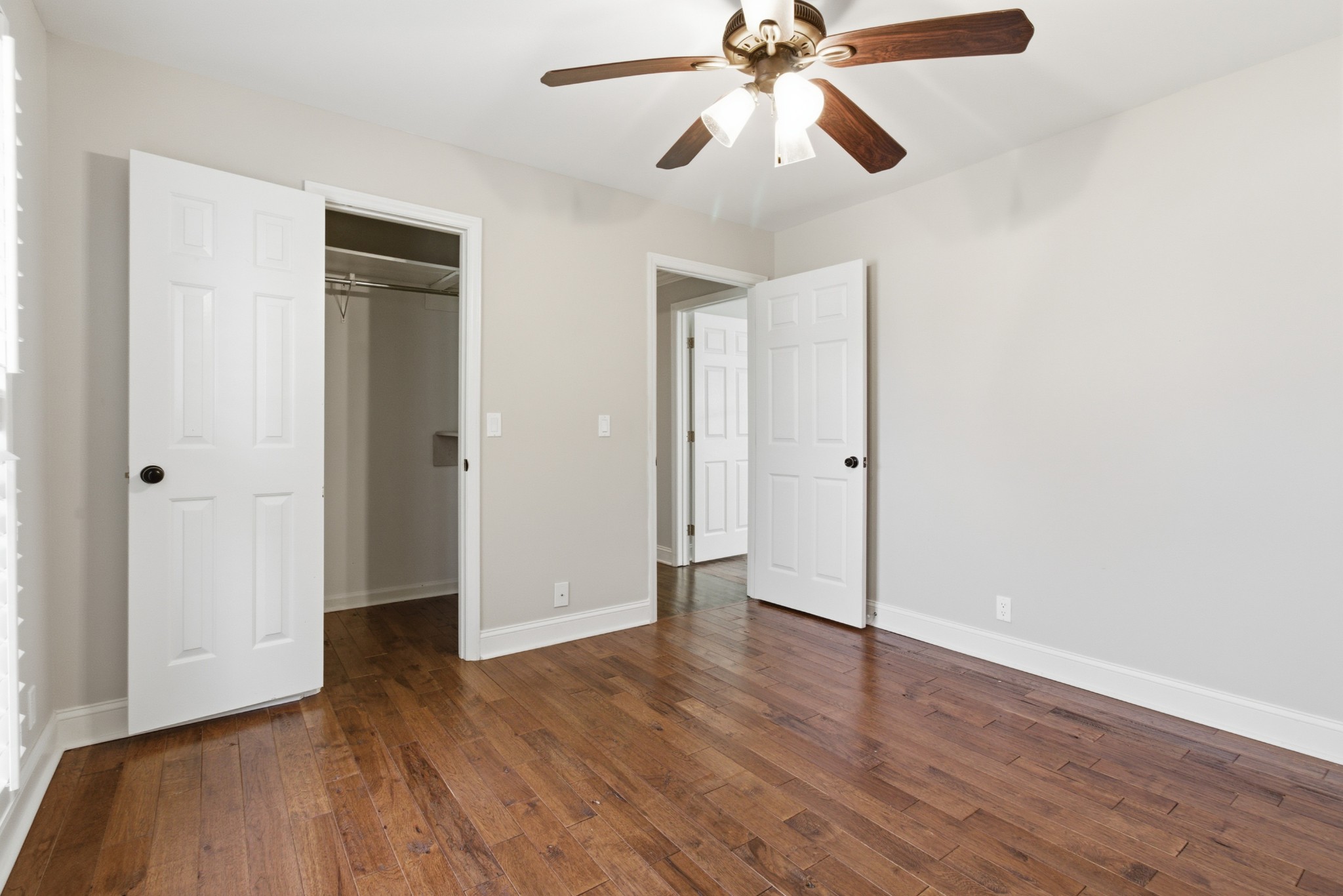 707 Banner Drive Murfreesboro, TN 37129 - Photo 15 of 46 an empty room with wooden floor closet and fan
