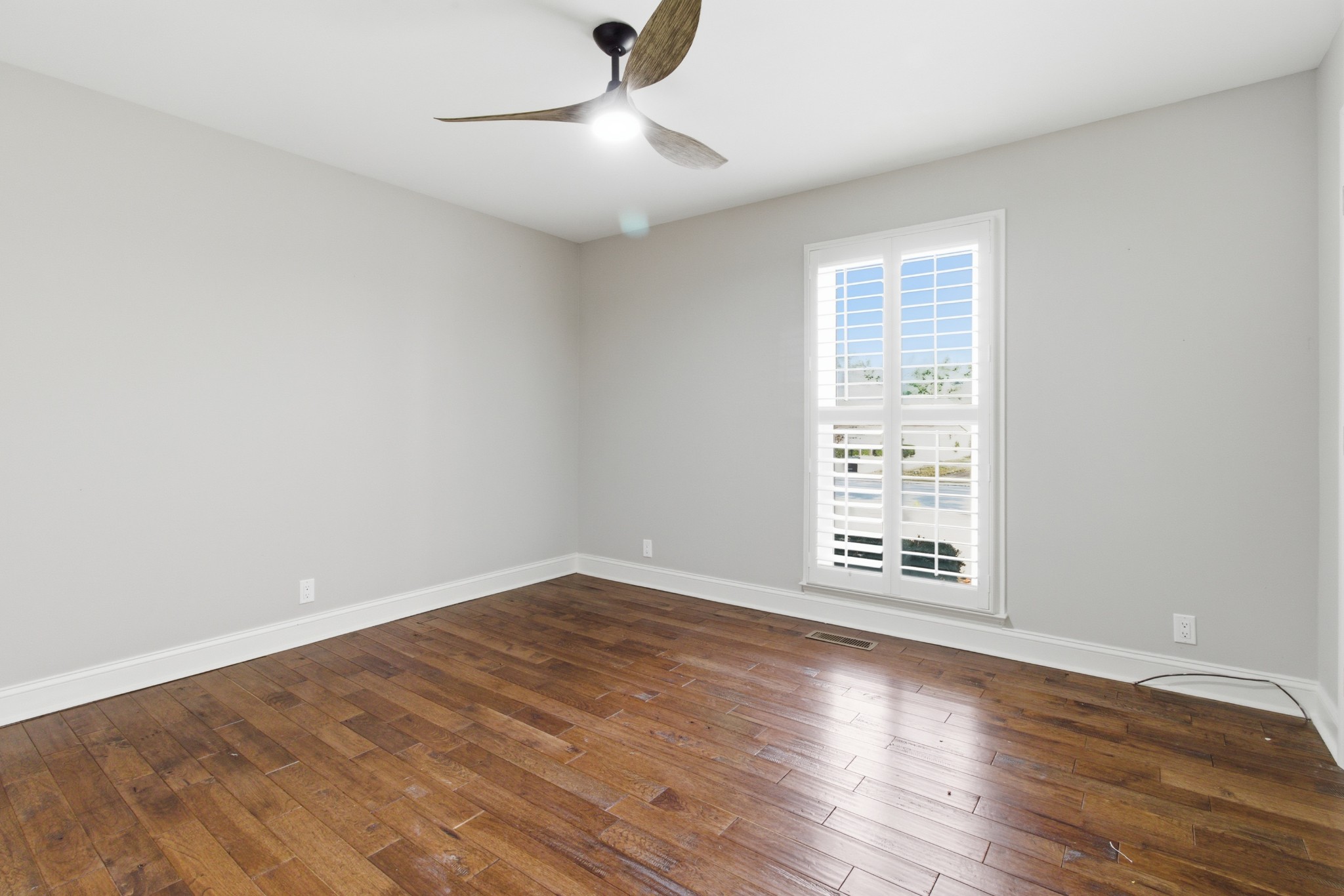 707 Banner Drive Murfreesboro, TN 37129 - Photo 20 of 46 an empty room with wooden floor fan and windows