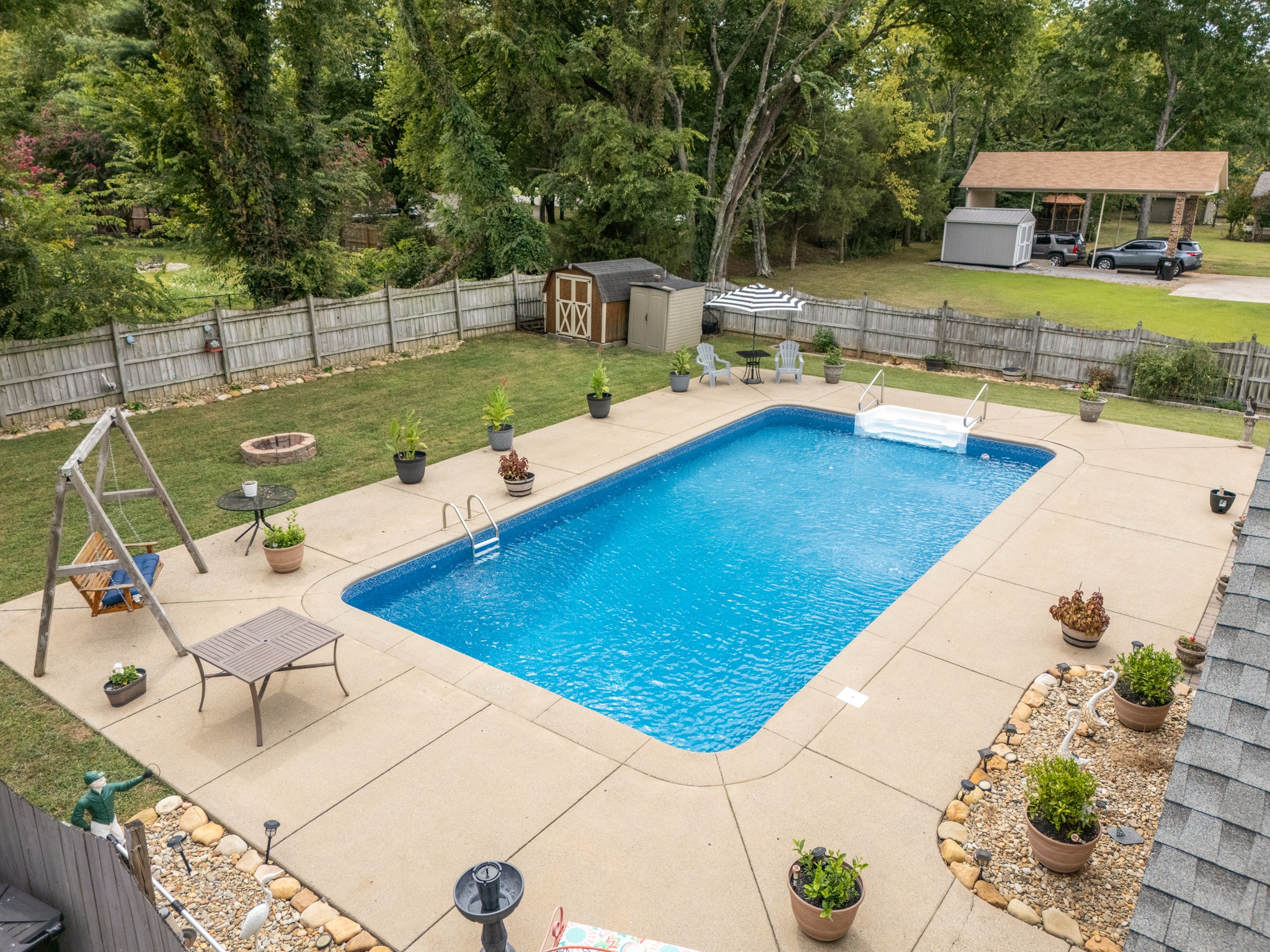 707 Banner Drive Murfreesboro, TN 37129 - Photo 2 of 46 a view of a swimming pool with a patio