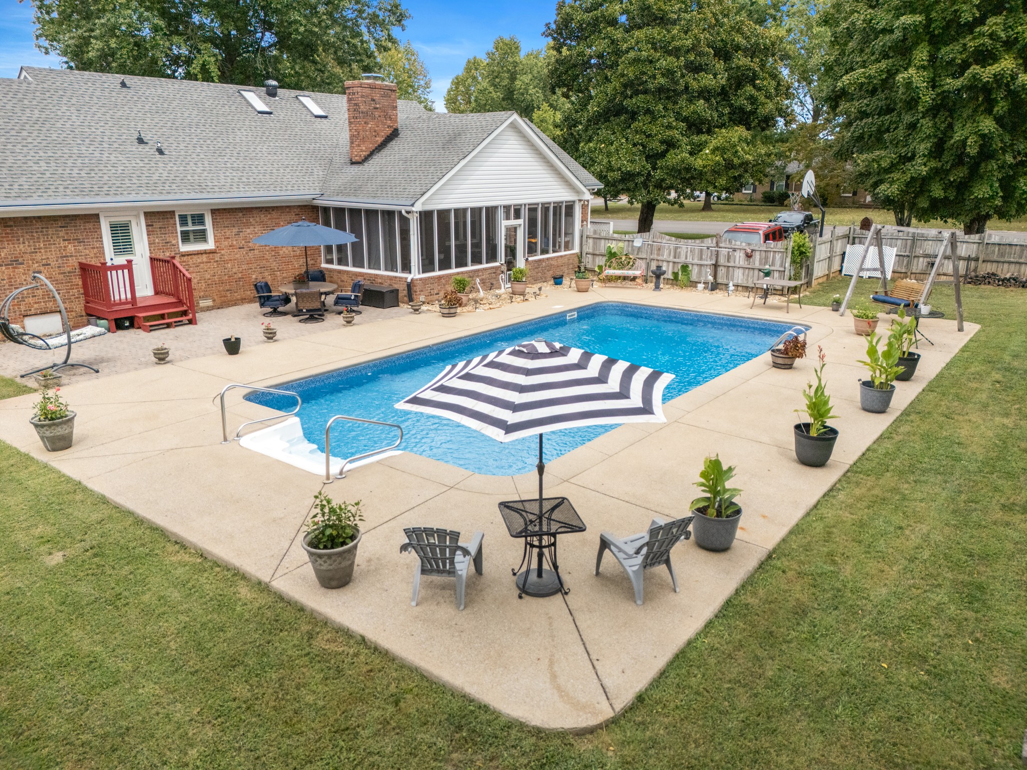 707 Banner Drive Murfreesboro, TN 37129 - Photo 3 of 46 a view of a house with swimming pool and sitting area