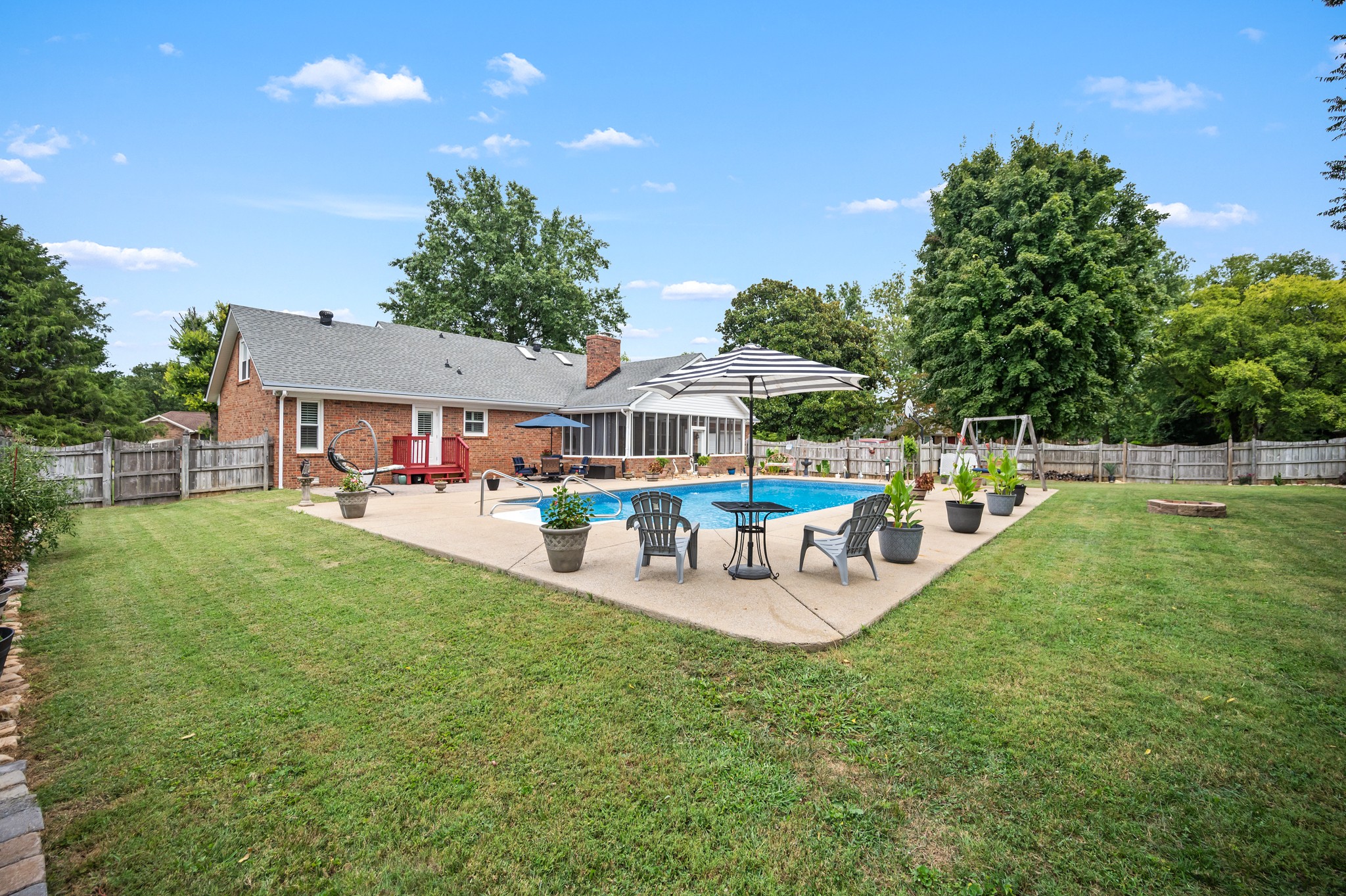 707 Banner Drive Murfreesboro, TN 37129 - Photo 37 of 46 a view of house with backyard and outdoor seating