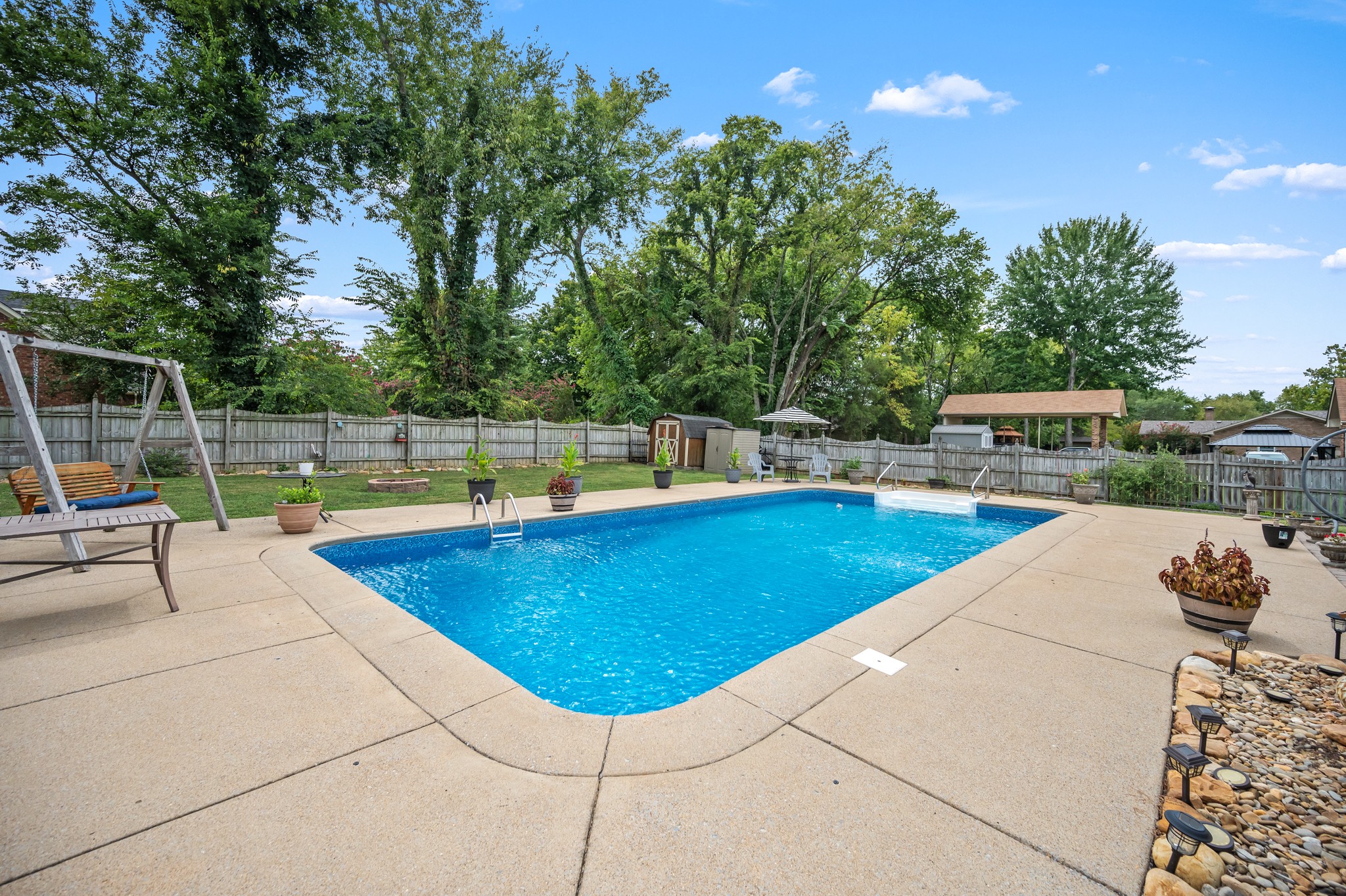 707 Banner Drive Murfreesboro, TN 37129 - Photo 39 of 46 a view of a swimming pool with a patio and a yard