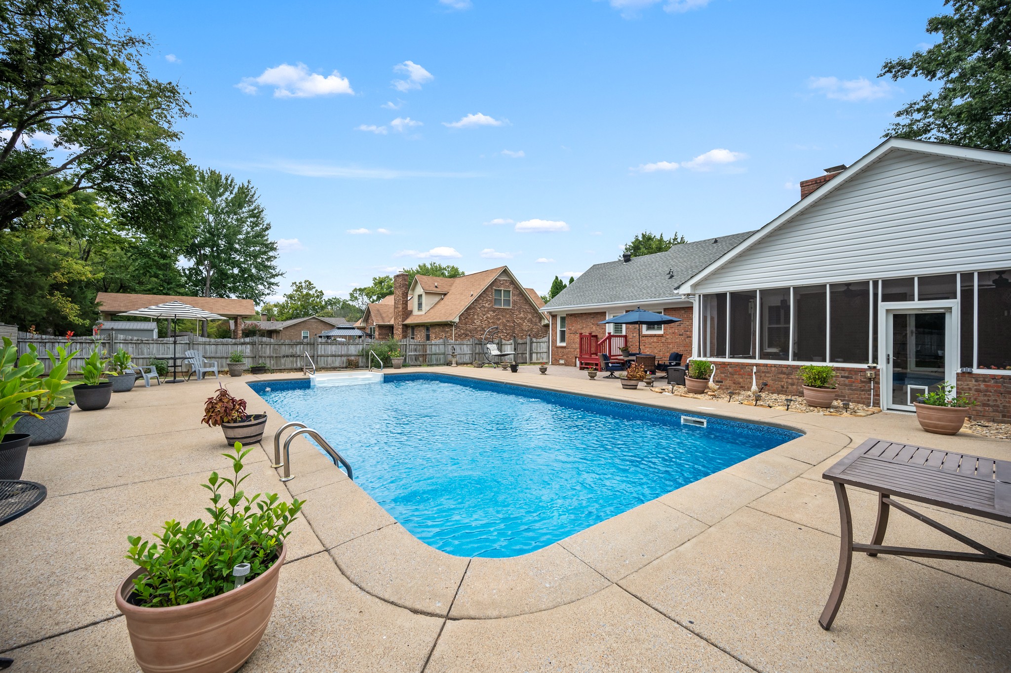 707 Banner Drive Murfreesboro, TN 37129 - Photo 40 of 46 a view of a swimming pool with a lounge chair