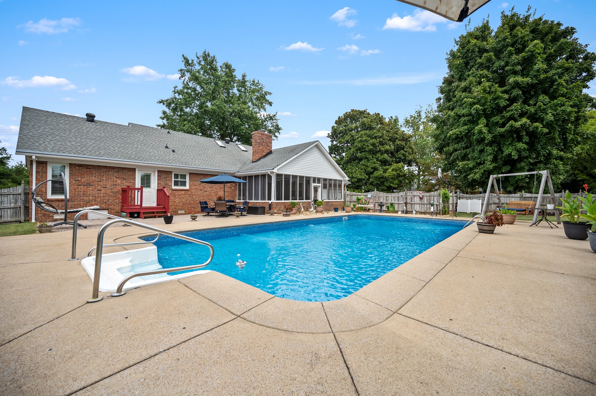 707 Banner Drive Murfreesboro, TN 37129 - Photo 41 of 46 a view of swimming pool with outdoor seating and a yard
