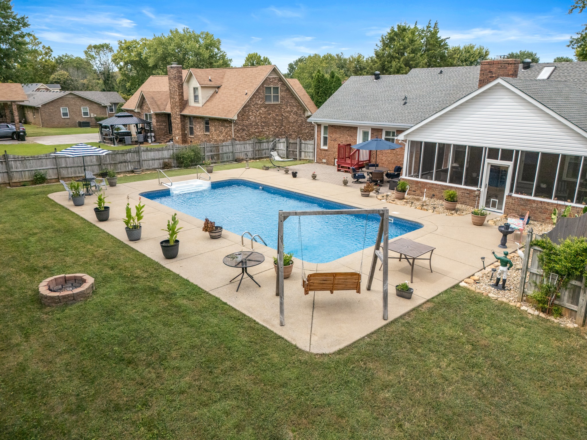 707 Banner Drive Murfreesboro, TN 37129 - Photo 43 of 46 an aerial view of a house having swimming pool patio and lake view