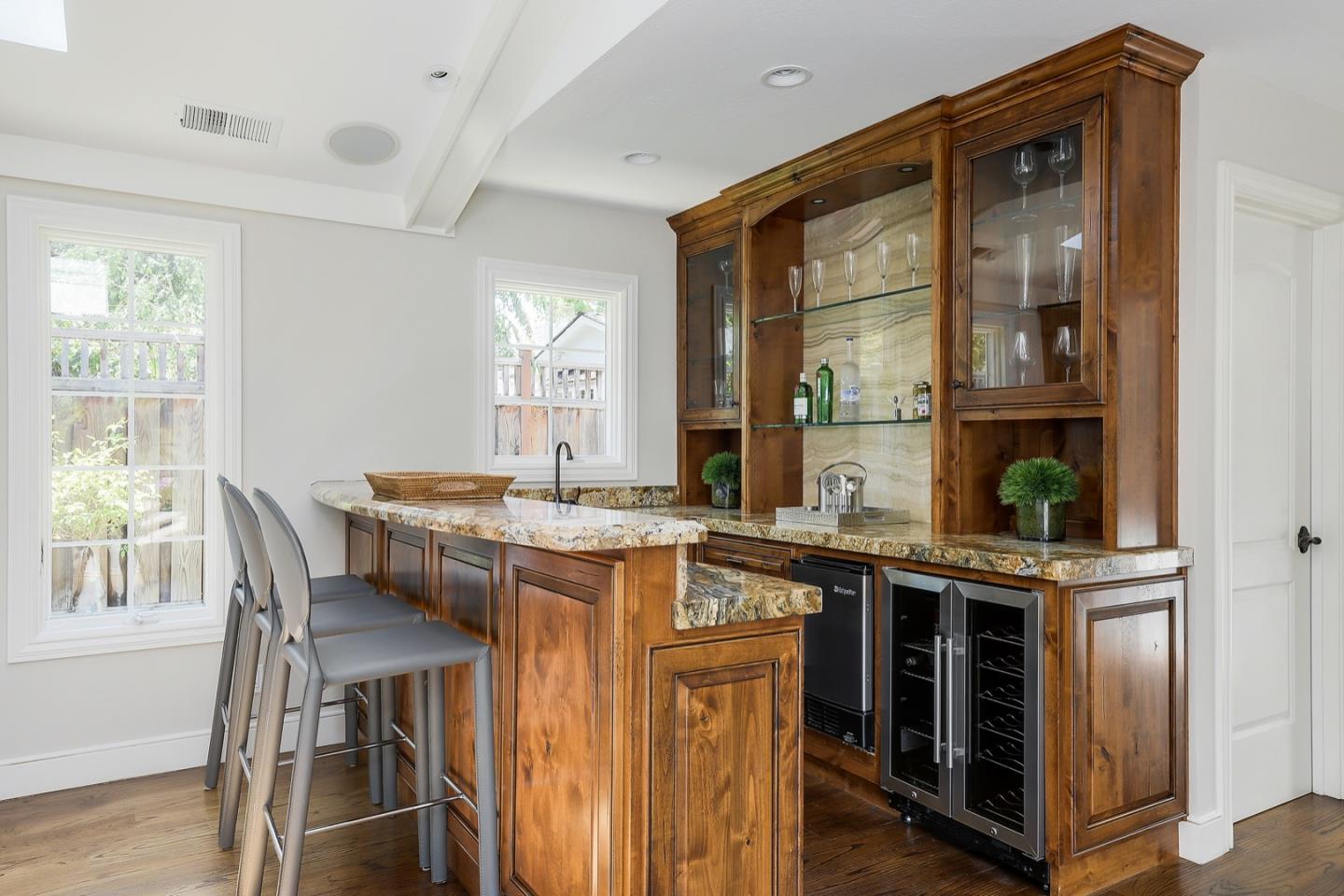 1433 Brookmill Road Los Altos, CA 94024 - Photo 11 of 39 a dining hall with stainless steel appliances granite countertop a stove and a sink