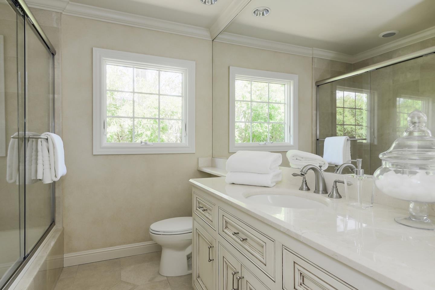 1433 Brookmill Road Los Altos, CA 94024 - Photo 19 of 39 a bathroom with a sink a toilet and shower