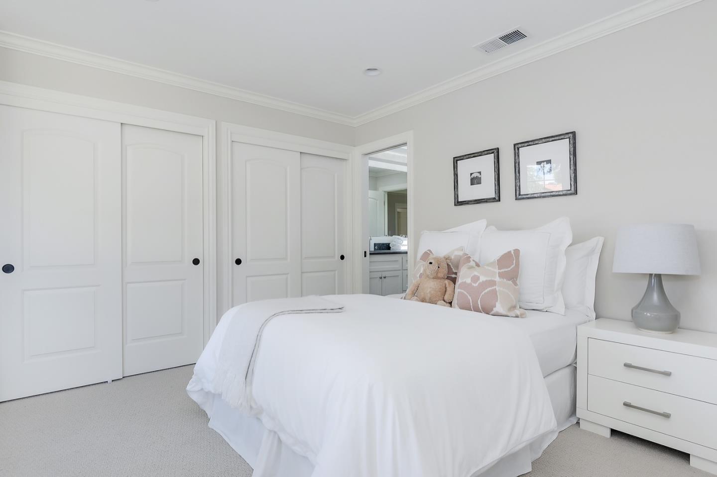 1433 Brookmill Road Los Altos, CA 94024 - Photo 20 of 39 a bed room with a bed and a night stand