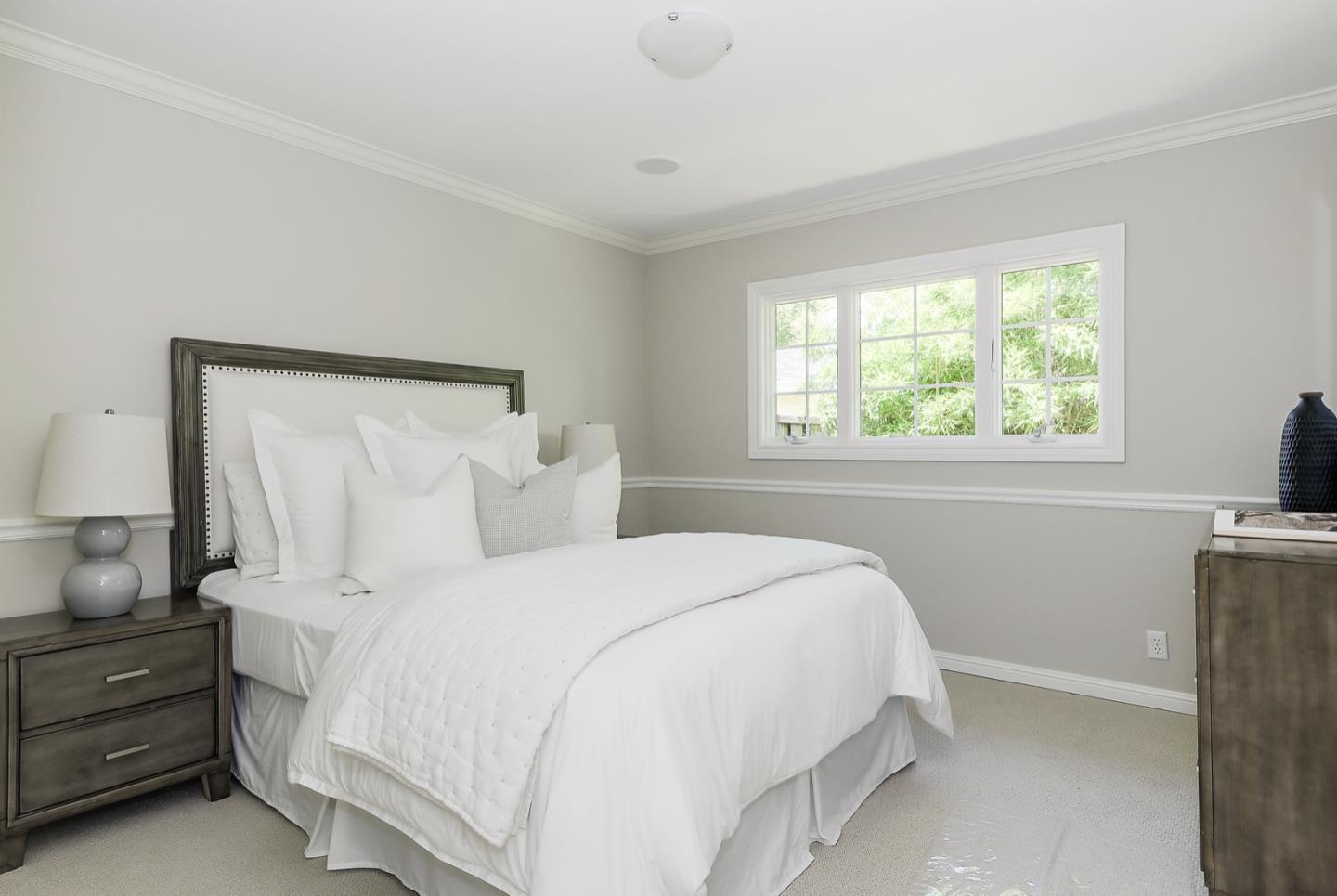 1433 Brookmill Road Los Altos, CA 94024 - Photo 22 of 39 a bedroom with a bed and a window