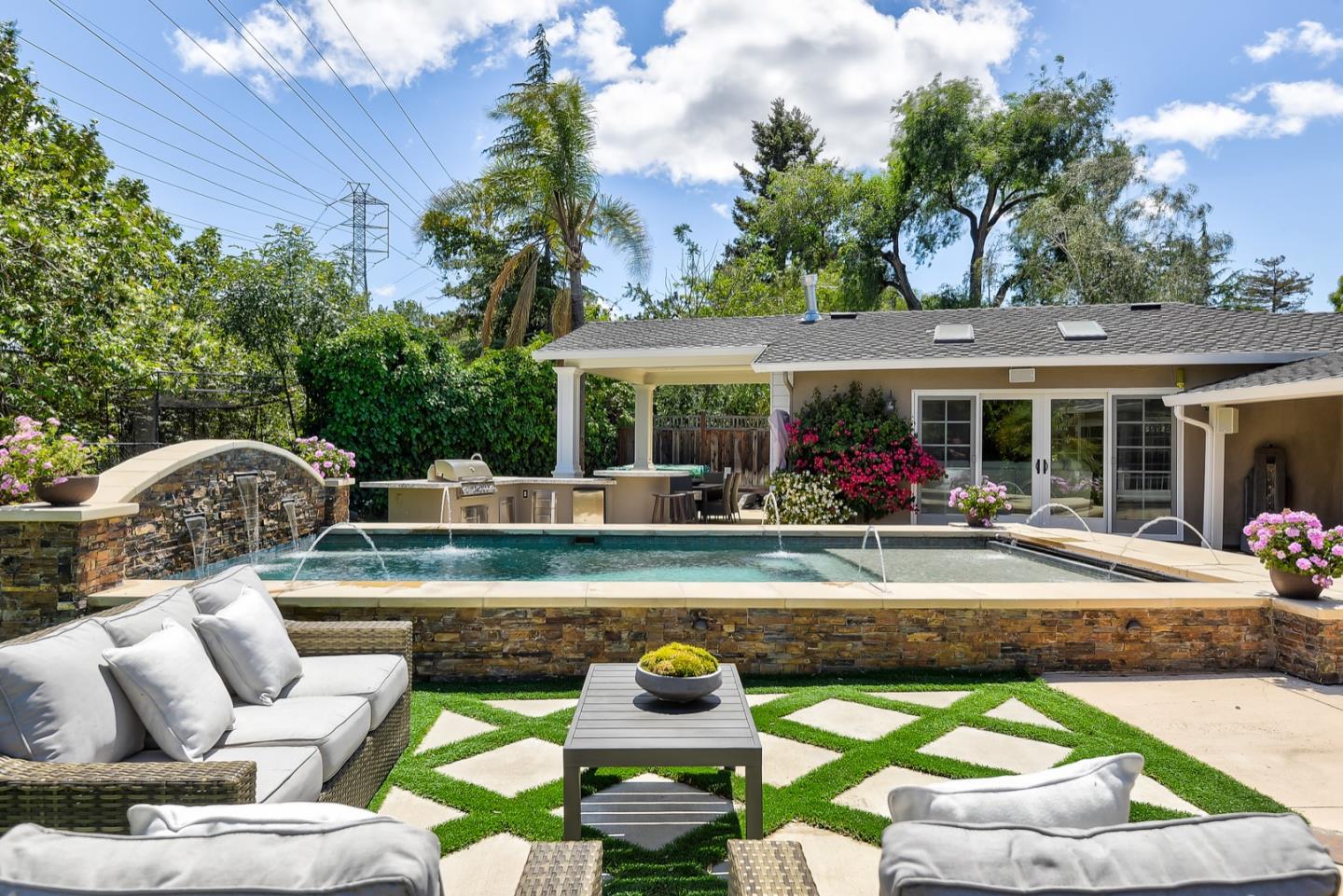 1433 Brookmill Road Los Altos, CA 94024 - Photo 28 of 39 a view of a house couches with swimming pool and furniture