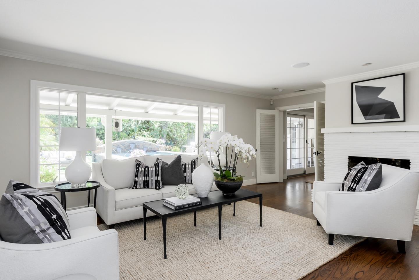 1433 Brookmill Road Los Altos, CA 94024 - Photo 3 of 39 a living room with furniture and a large window