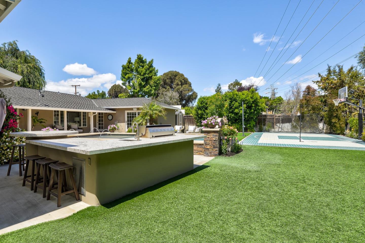 1433 Brookmill Road Los Altos, CA 94024 - Photo 31 of 39 a view of a house with a swimming pool