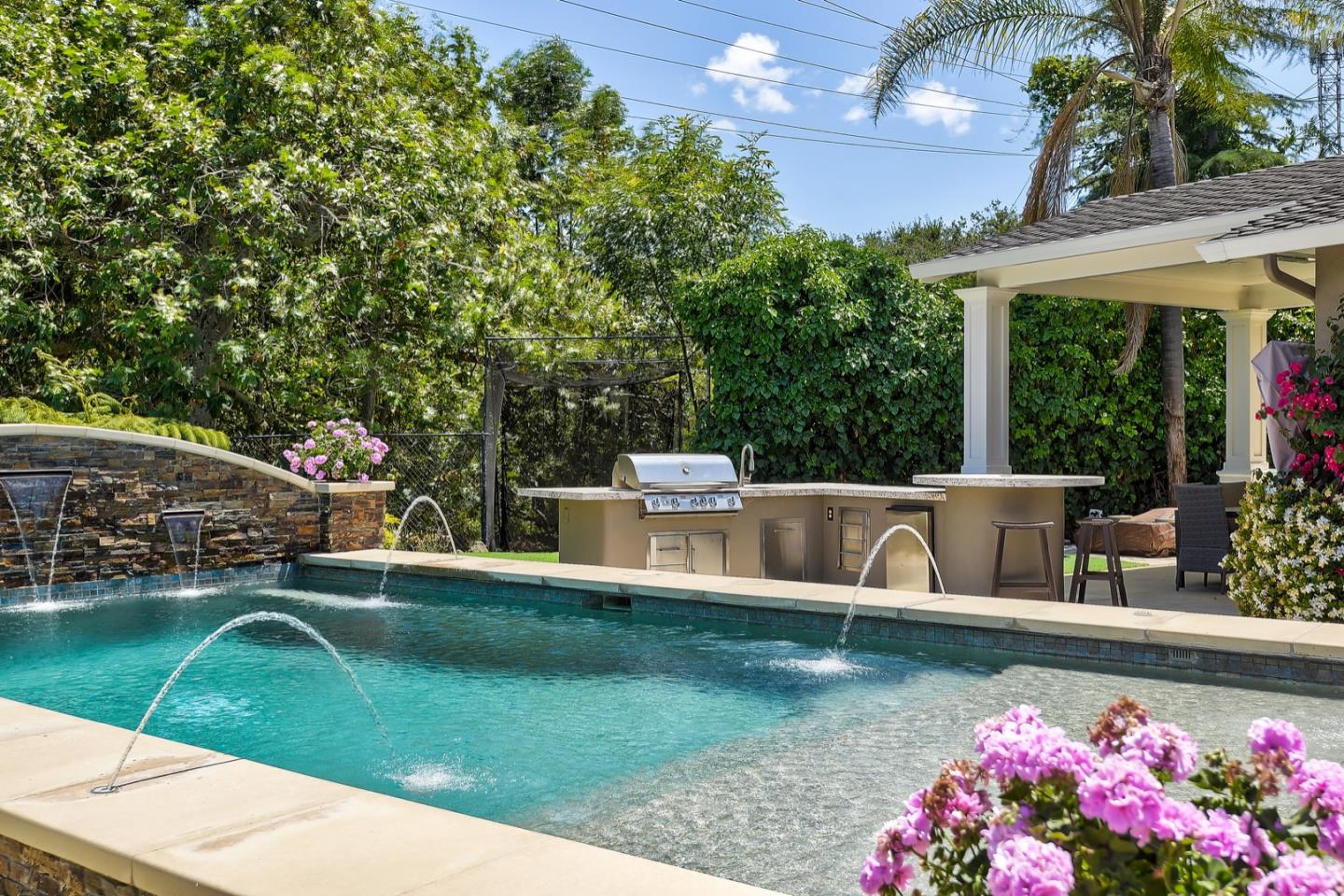 1433 Brookmill Road Los Altos, CA 94024 - Photo 32 of 39 a view of a house with a swimming pool