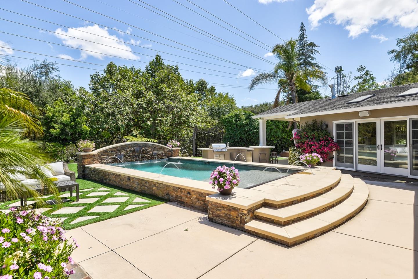 1433 Brookmill Road Los Altos, CA 94024 - Photo 33 of 39 a view of a backyard with a patio and swimming pool